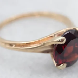 Yellow Gold Garnet Solitaire Bypass Ring