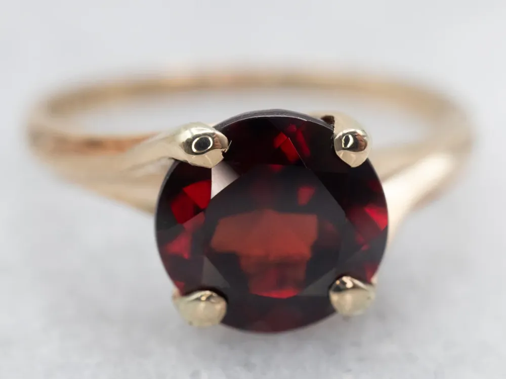 Yellow Gold Garnet Solitaire Bypass Ring