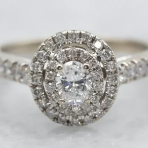 Modern Oval Cut Diamond Engagement Ring Double Diamond Halo