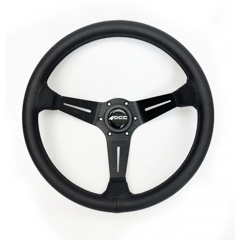 VOLANTE DESPLAZADO MOD. TIMEPROOF PIEL PERFORADA BRAZOS NEGROS OCC MOTORSPORT met FIA-label